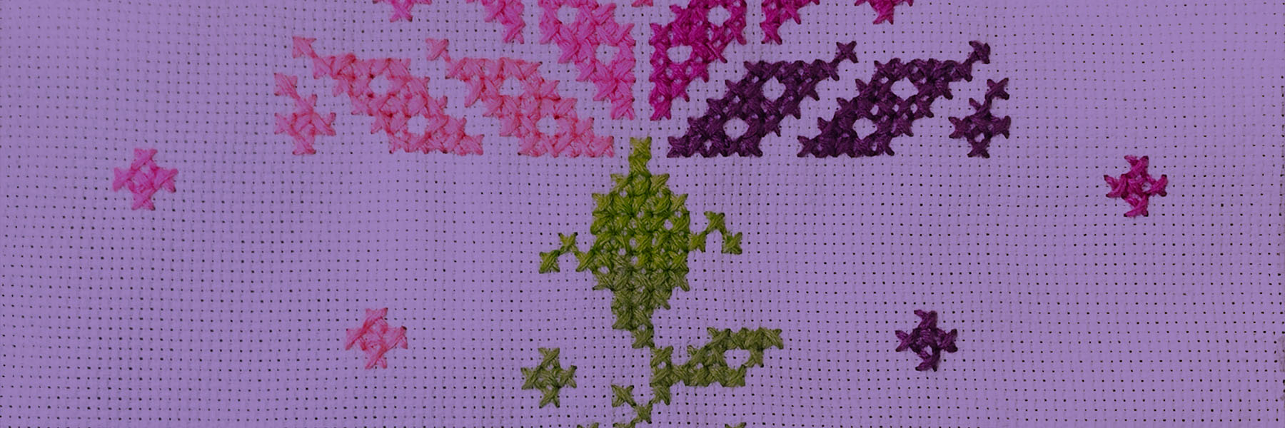 An image of a cross-stitched thistle