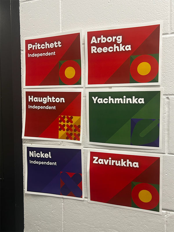 A photo of room label posters for a dance festival