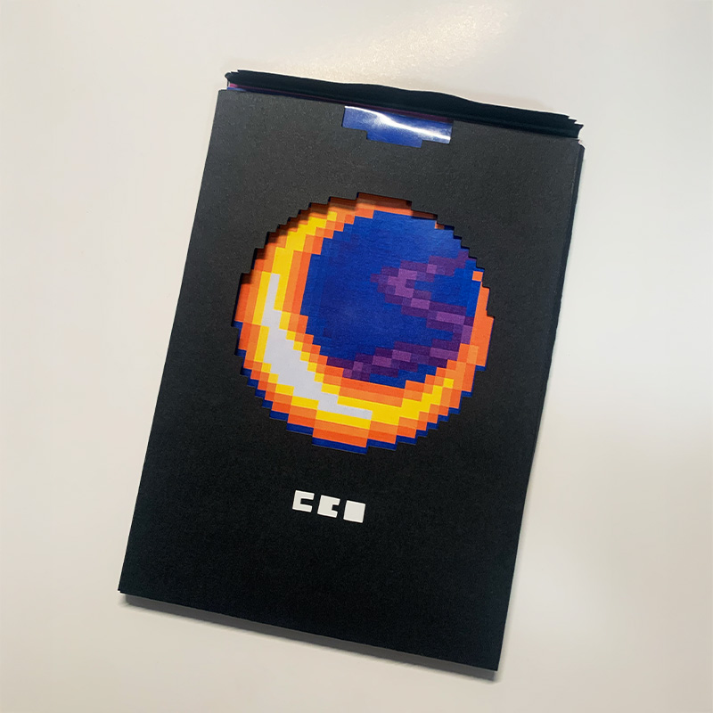 A photo of a package holding a print set inside